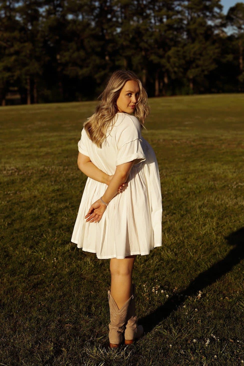 Golden-hour portrait in a field